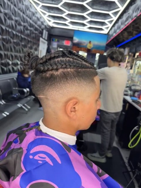Video: braids done one by one over a skin fade.